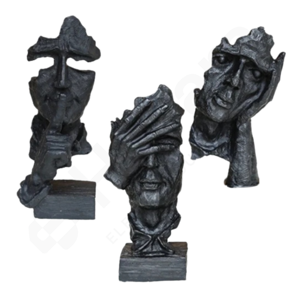 Set of three decorative sculptures of faces on a white background