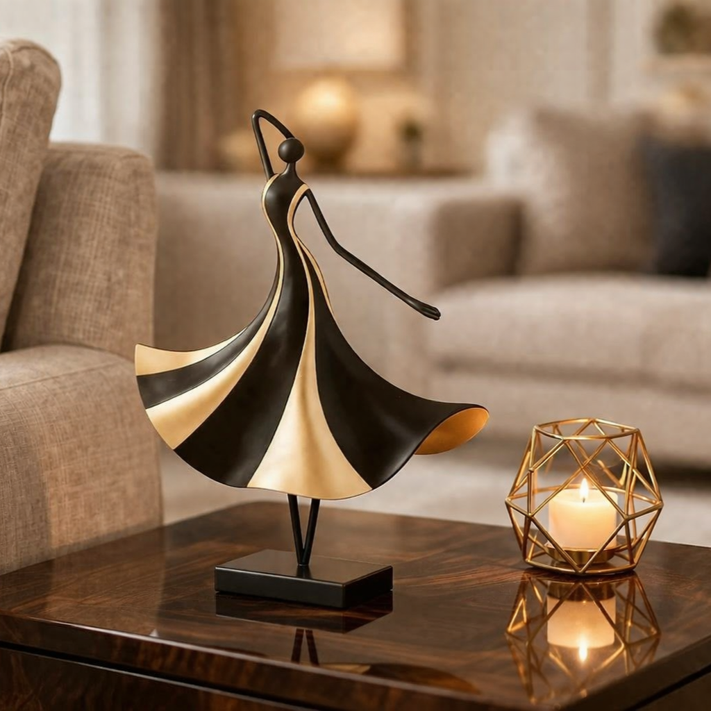 Decorative sculpture on a table with a candle in a geometric holder, in a living room setting.
