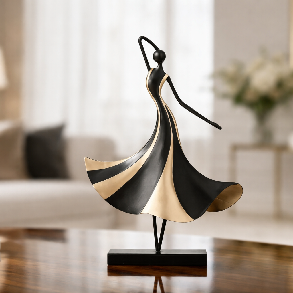 Decorative sculpture of a woman in a flowing dress on a table with a blurred indoor background