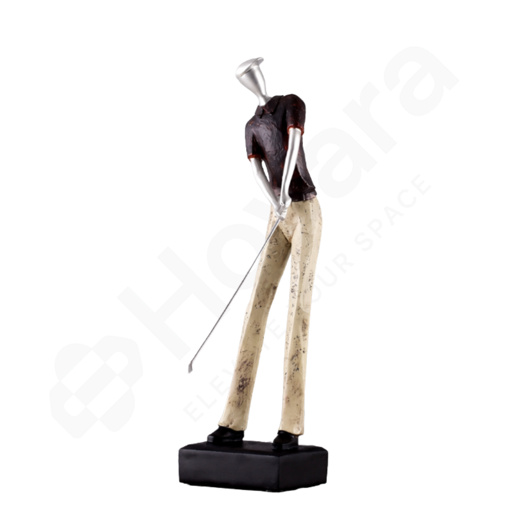 Decorative sculpture of a golfer on a white background