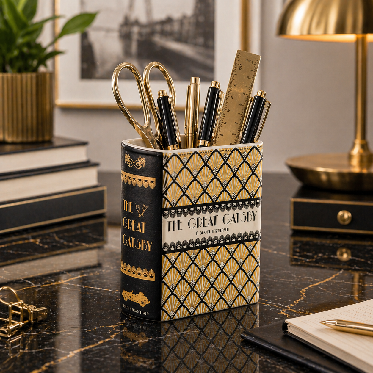 Pencil holder with stationery items on a desk, featuring 'The Great Gatsby' book design.