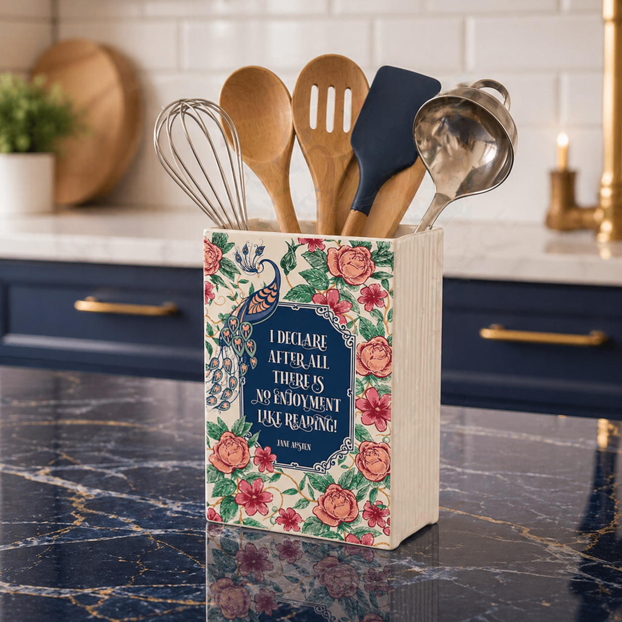 Decorative kitchen utensil holder with floral design and quote on a kitchen counter.