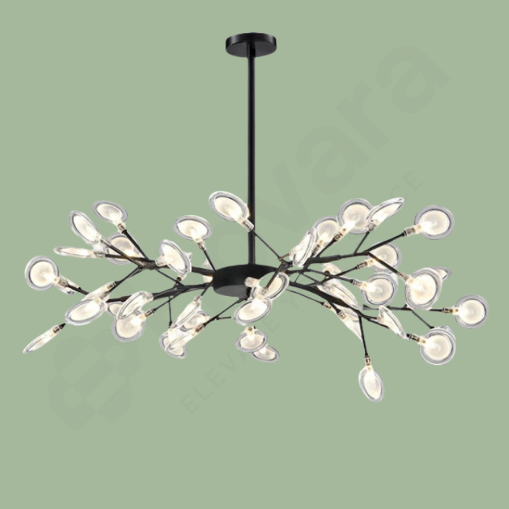 Modern chandelier with multiple light fixtures on a green background