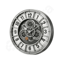 Mechanical wall clock with visible gears on a white background