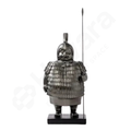 Statue of a warrior in armor holding a spear on a white background
