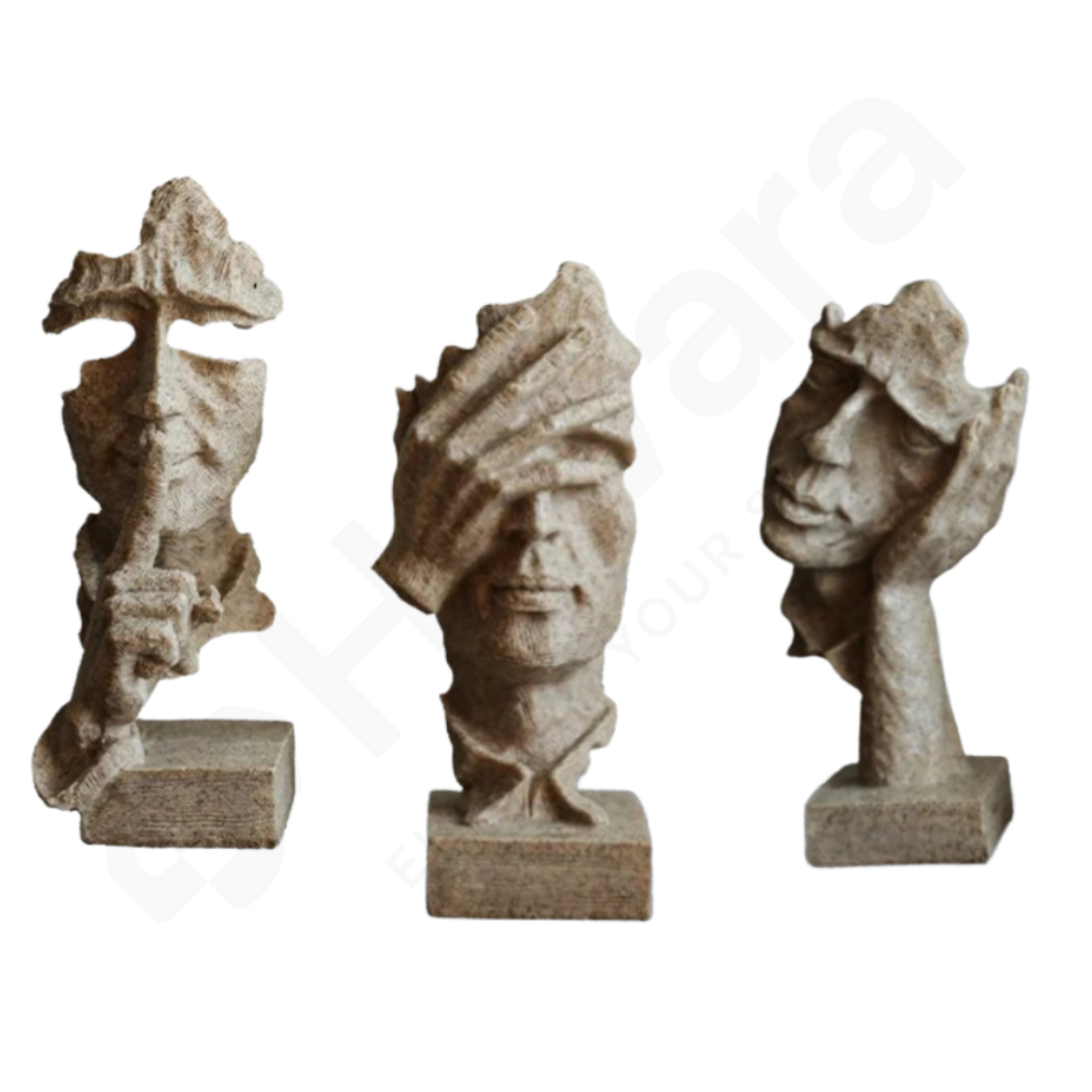 Three stone sculptures on a white background