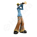 Statue of a person playing a trumpet on a white background